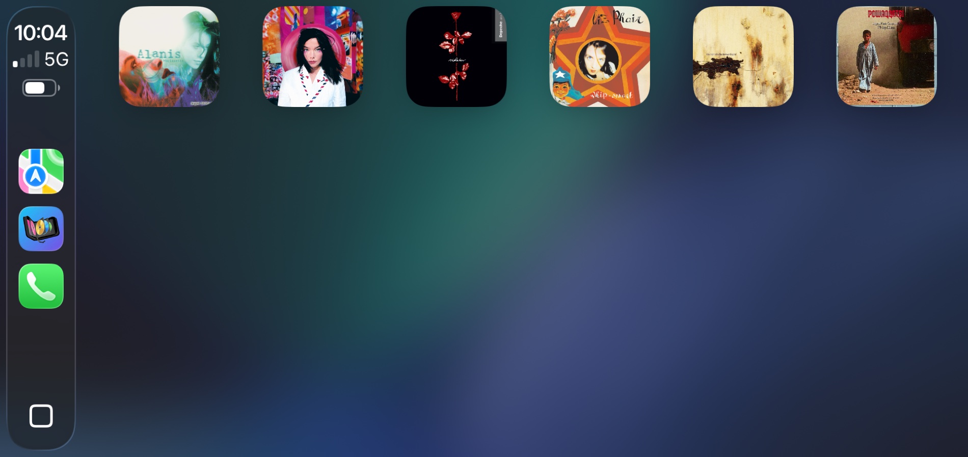 Six album covers on the CarPlay screen with the grid mostly empty, room for more.