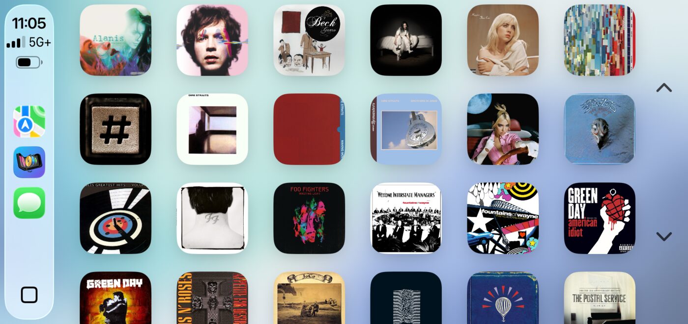 The CarPlay grid packed full of album covers, a loaded CD changer.